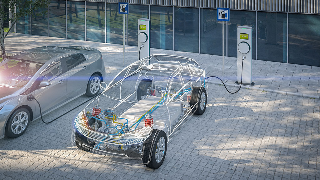 Electric car battery connected to public battery charger - Electric Transportation
